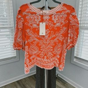 Coral and cream embroidered blouse